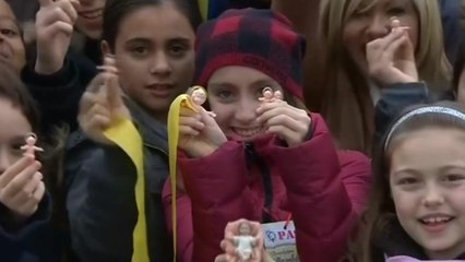 Pope blesses children's baby Jesus figurines