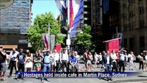 Hostages held inside Sydney cafe, Islamic flag held up