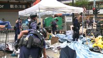 Hong Kong police make arrests as last protest site cleared