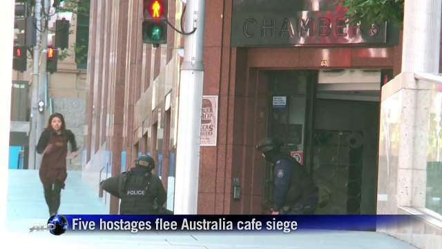 Five hostages flee Australia cafe siege
