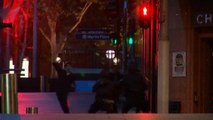 A group of hostages run from Sydney cafe hostage situation