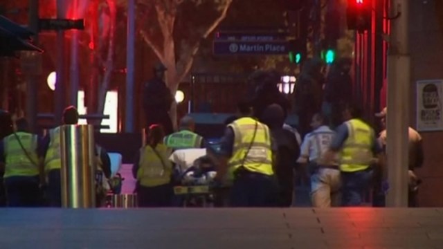 Security forces storm Sydney cafe under siege, injured removed