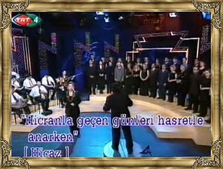 Asuman ASLIM GÖRGÜN *Hicrânla Geçen Günleri Hasretle Anarken*