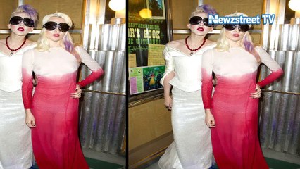 Blonde Electra Ruby flashes nipple in a sheer