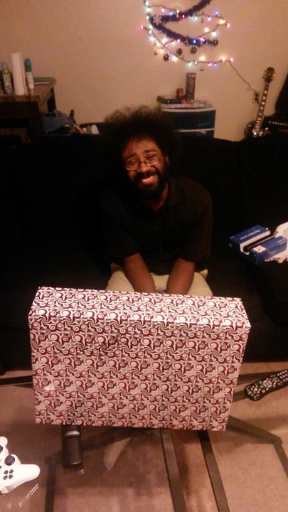 Guy Opening his awesome present is so so happy! PS4...