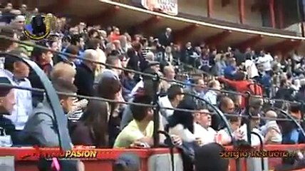 very brave man playing with bull.