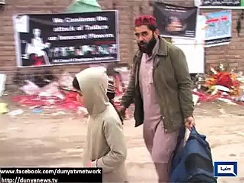 Dunya News- Peshawar- People continue to visit Army Public School to hold vigil for martyrs on day-7 of attack.