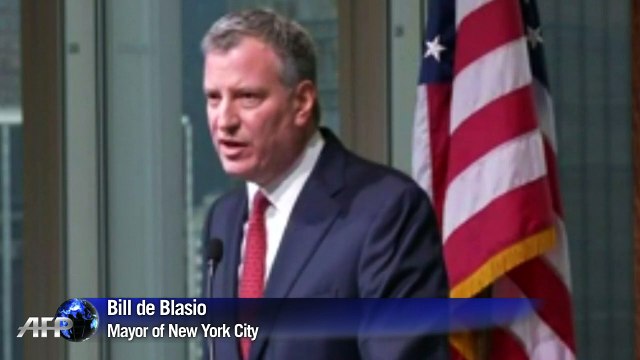 New York mayor calls for end of protests after policemen murders