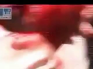 Angel in Syria appears holding a wounded man at the time of war