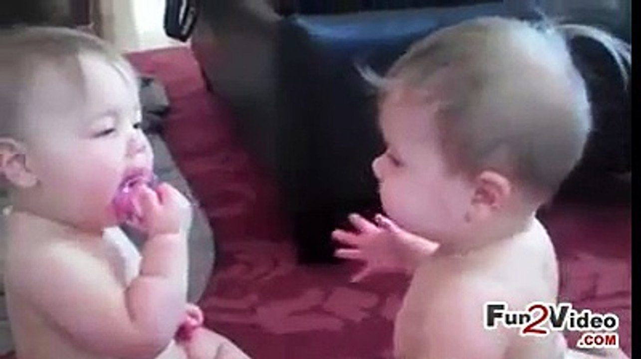 Two Cute Babies  Fighting on One Mouth Toy