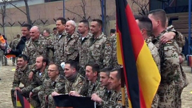 British and Germans re-enact football match 100 years on