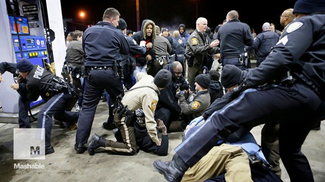 Clashes near Ferguson after an officer kills an armed black teen