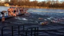 Swimmers take the icy plunge for annual Christmas Day swim