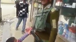 kid wants the gun of Pakistan army person.