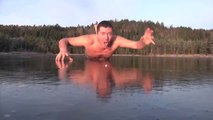 Crazy norwegian guy almost naked on frozen lake : Merry Christmas 2014