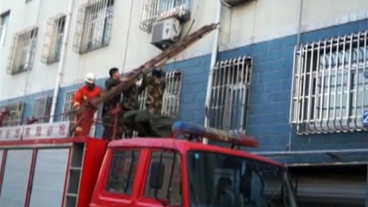 Firefighters rescue toddler left dangling from a window