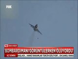 Savaşı uçağının bombardımanını görüntülerken canından oluyordu