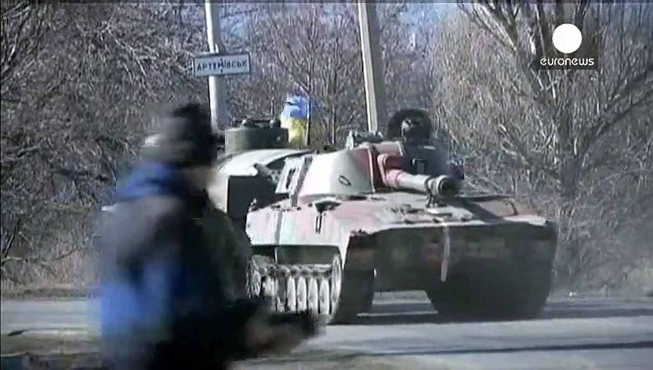 Kyiv says it can not withdraw heavy weapons while still under attack