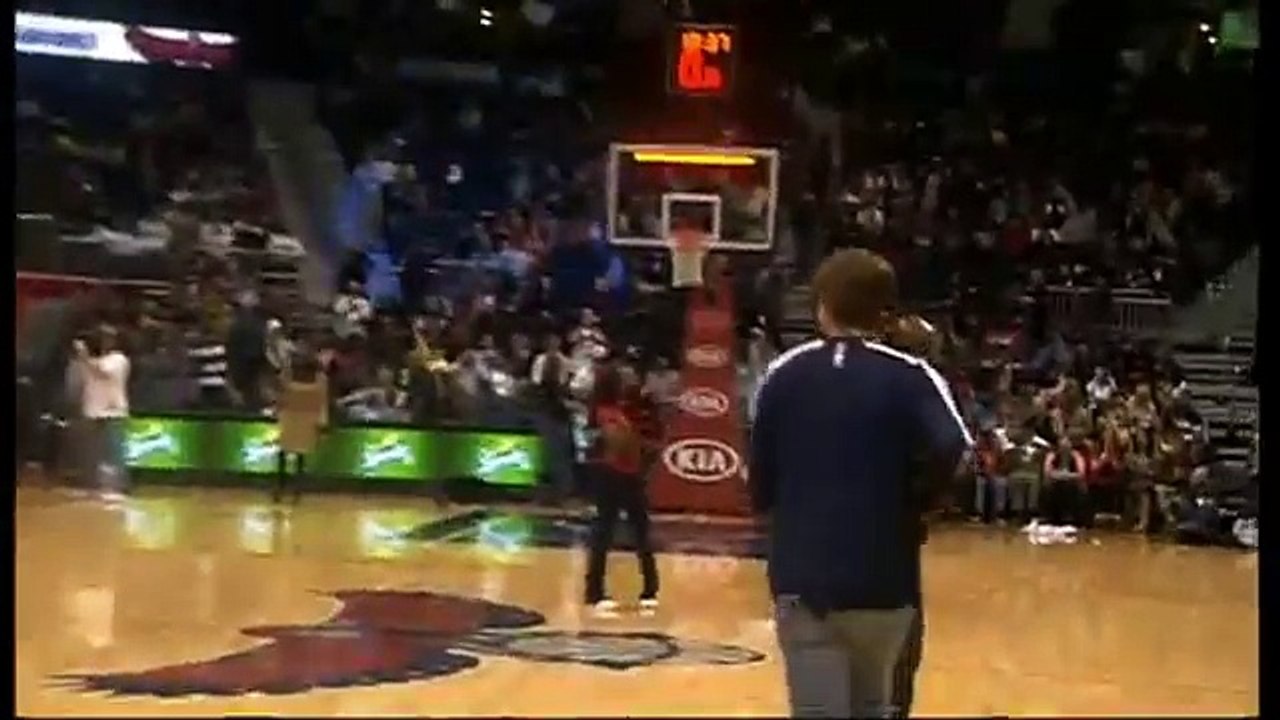 Hawks fan throws 'Miracle Shot' from half court!