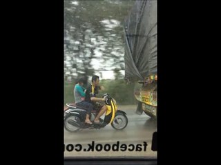 Some People Will Do Anything To Keep Their Hair Dry