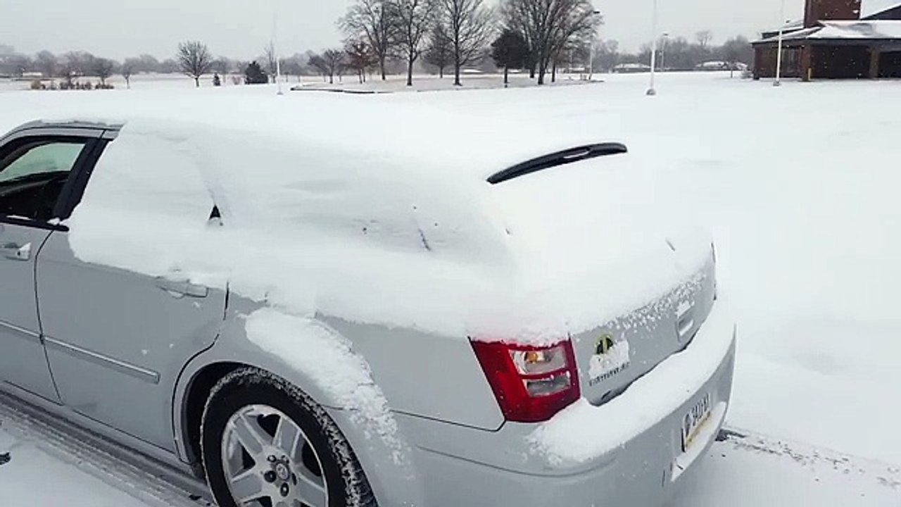Bass on “Turn Down for What” Removes Snow on Car