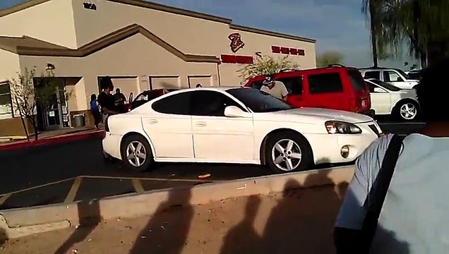 Crazy ROAD RAGE : Guy hangs on to car and almost gets killed