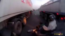 Biker Fall Between Two Trucks | lucky accident, biker lucky accident, biker escape in accident