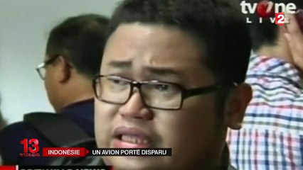 Les proches des disparus du vol AirAsia QZ8501 plongés dans l'angoisse