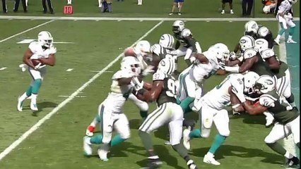 Daniel Thomas pushes through for 1-yard TD