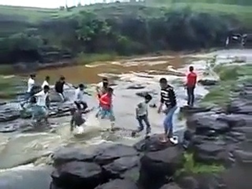 Family Drowned in a Water Fall