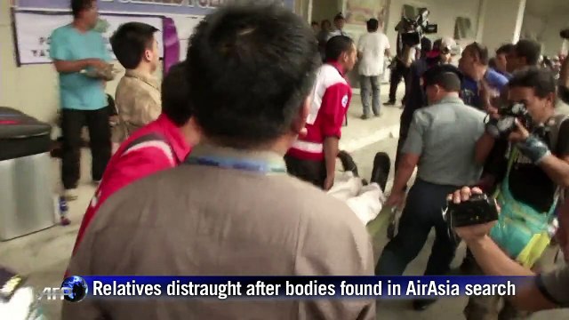 Distraught relatives taken off on stretchers as bodies found