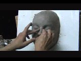 Amazing Sculpted female face in clay