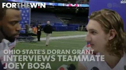 Ohio State's Doran Grant interviews teammate Joey Bosa