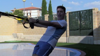 Ejercicios con TRX para el dolor de espalda - Gato que se estira en TRX