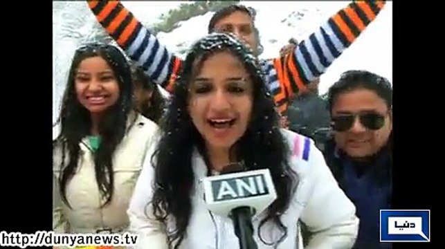 People enjoy snow falling in Shimla - India