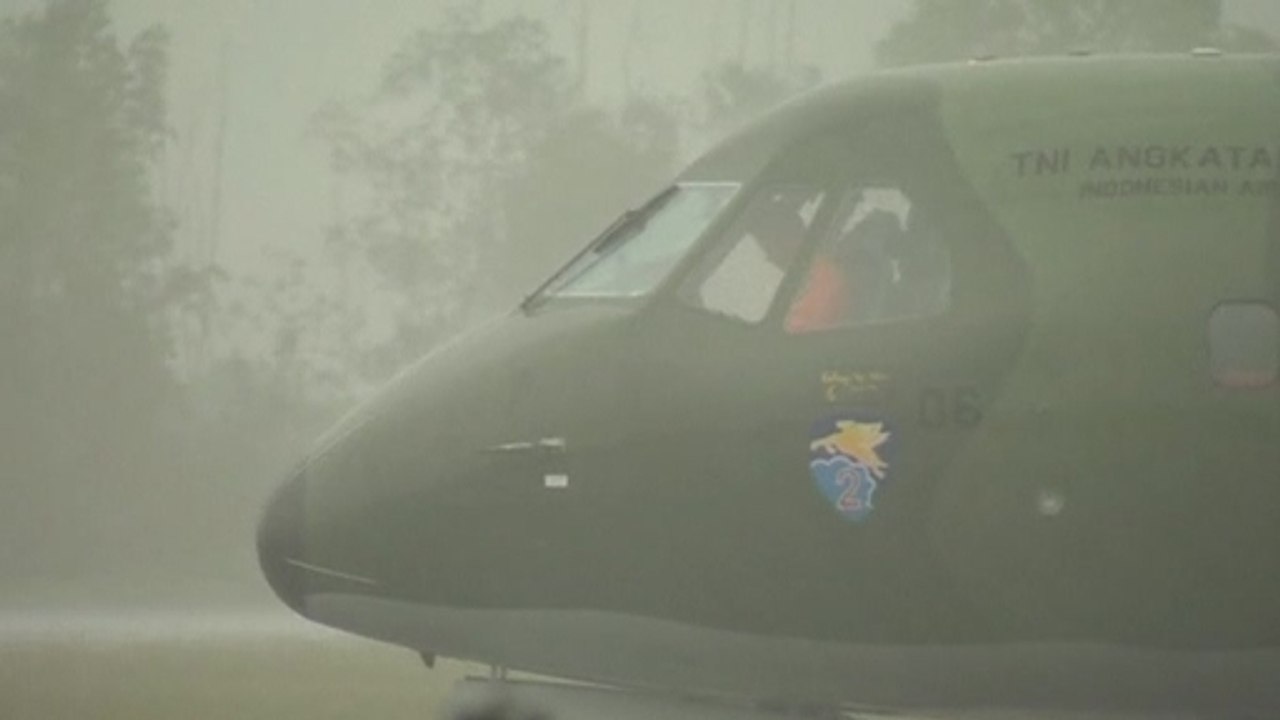 Bad weather cuts short AirAsia crash search