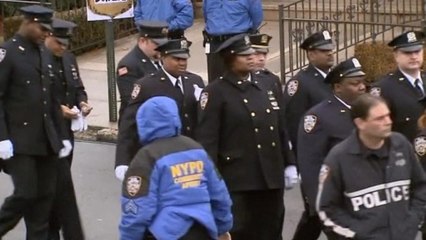 Thousands attend funeral of slain policeman