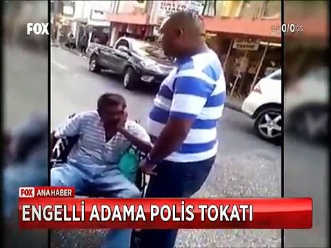 Tekerlekli sandalyedeki engelli adama tokat atan polis görevden alındı
