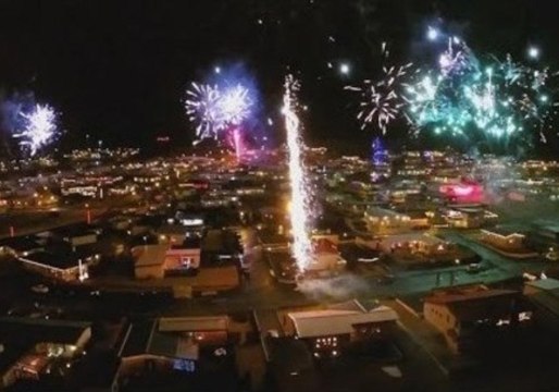 Fireworks Light the New Year's Eve Night Sky Over an Icelandic Island