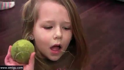 Dog Helps Girl Remove Loose Tooth