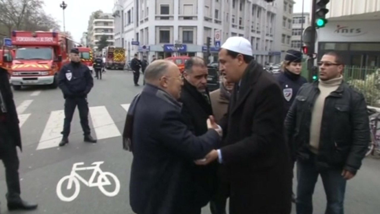 Parisians "horrified" by carnage at weekly newspaper