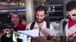 Jamie Dornan Gets Mobbed at Los Angeles Airport, Gets Asked About His 'Grapes'