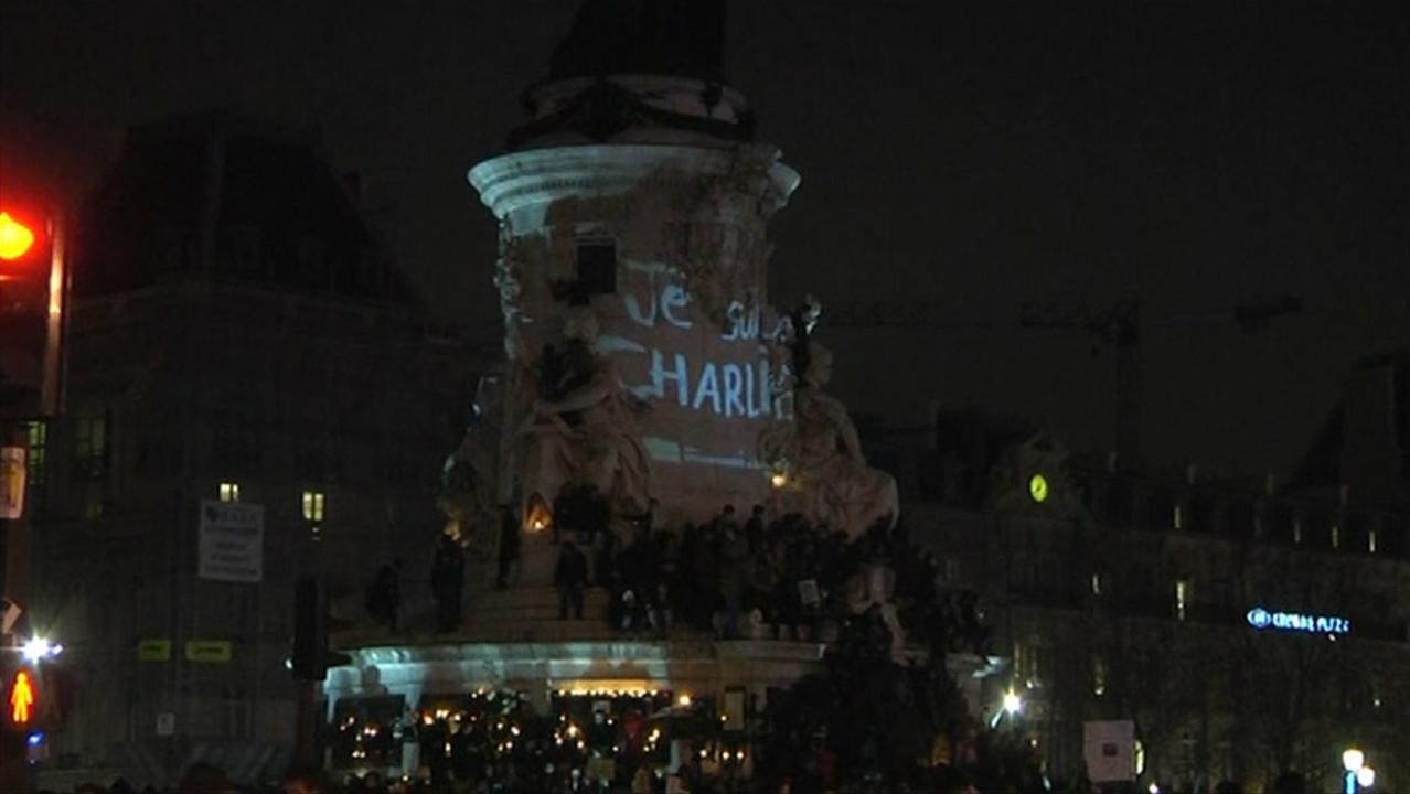 Thousands Gather In Paris To Support, Mourn Shooting Victims