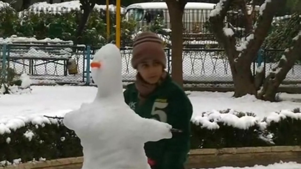 "I hope this white color fills people's hearts" - Damascus resident