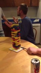 Drunk guy doing crazy Jenga Knife Shot