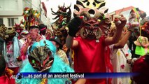 Dancing devils take over Ecuadorian town in ancient festival