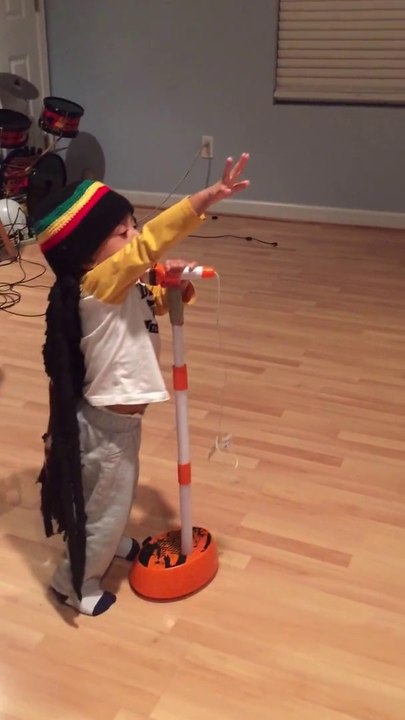 2-years-old boy singing "Get up stand up", impersonating Bob Marley! CUTE...