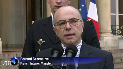 Car chase, hostage drama as Paris massacre suspects cornered