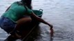Dangerous way to fish Piranhas in Brazil : crazy but courageous girl!