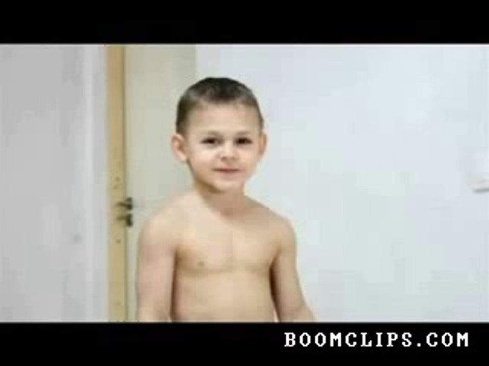 Kid Does Push Ups On Glass Bottles